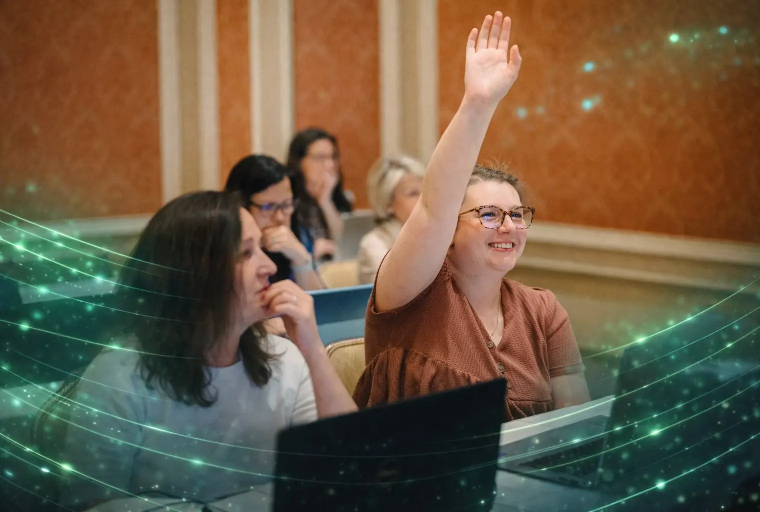 Our Commitment Client Rasing hand in a working Summit Session